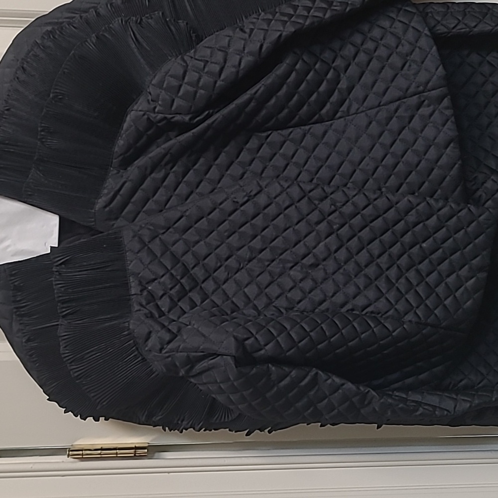 Oro Solo quilted black suit
